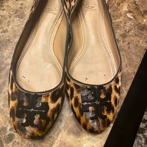 Faux fur, leopard print Tory Burch flats.